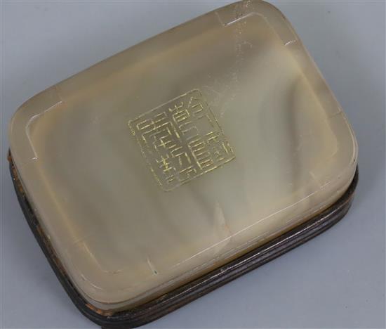 A Chinese agate rectangular box and cover, 7.1cm, wood stand